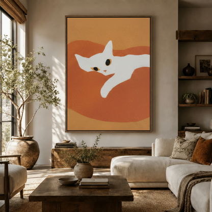 Minimalist white cat canvas wall art on burnt orange background displayed above sofa in warm living room