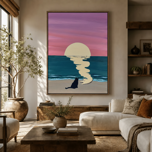 Black and white cats sunset beach canvas wall art displayed above a wooden sideboard in a warm living room