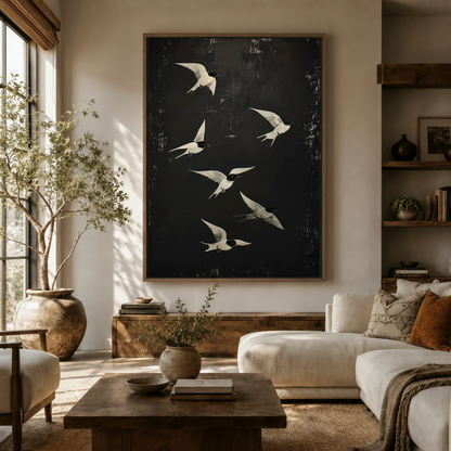Dark moody swallows canvas wall art displayed in a warm neutral living room above a wooden console