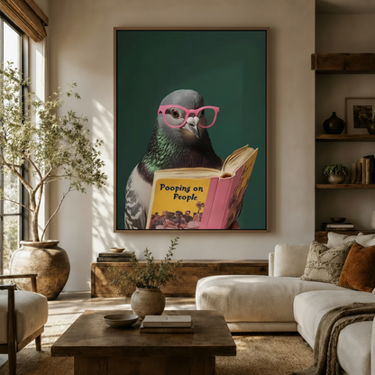 Funny pigeon reading book canvas wall art displayed above sofa in a cozy boho living room with warm neutral tones
