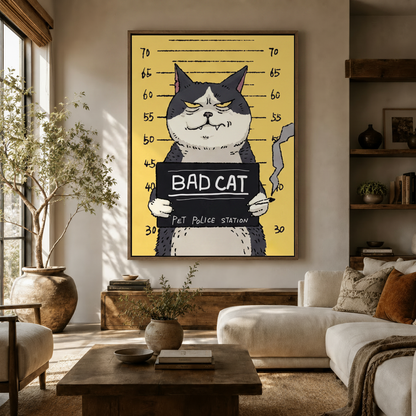 Bad Cat mugshot cartoon canvas print displayed above sofa in warm earthy living room