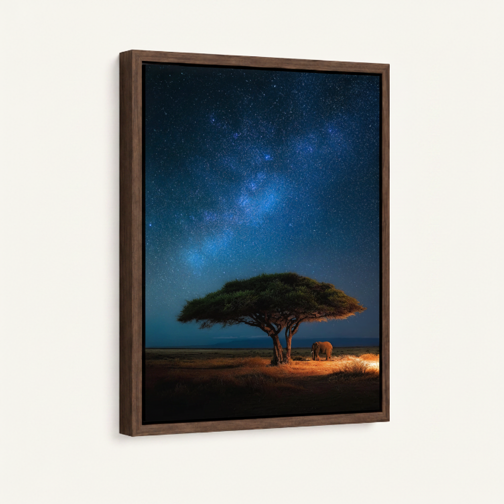 African savanna starry sky framed canvas wall art – night landscape with lone acacia tree under Milky Way and distant campfire by Aurewall