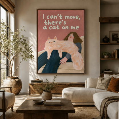 Funny cat illustration canvas print displayed in warm living room with olive tree and neutral sofa