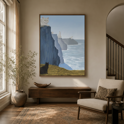 Coastal cliff cat wall art displayed in neutral entryway with arched doorway and wooden console