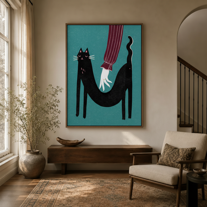 Whimsical black cat illustration framed print styled in warm entryway with arched doorway