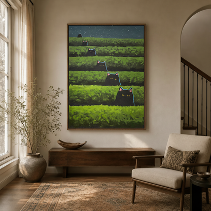 Folk art black cats peeking over green hills painting hung in a dark wood entryway