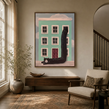 Framed whimsical cat canvas wall art hanging in a bright entryway with staircase and neutral decor