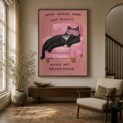 Humorous black cat with sleep mask and martini painting in floating frame hung in a bright entryway