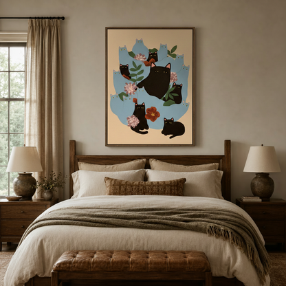 Whimsical cat floral canvas in walnut floater frame above a linen bed in a warm bedroom setting