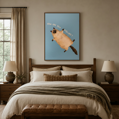 Siamese cat "How Are You Feeling" canvas above a linen bed in a warm bedroom setting