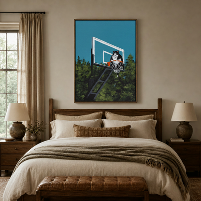 Funny cat sitting in basketball net canvas wall art above a neutral bedroom bed
