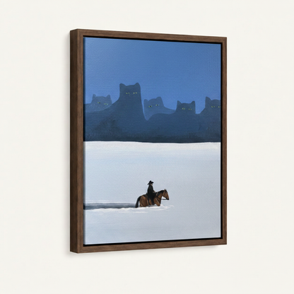 Dark walnut floater frame canvas with cowboy and glowing-eyed cat mountains, 3/4 angle product view on white background