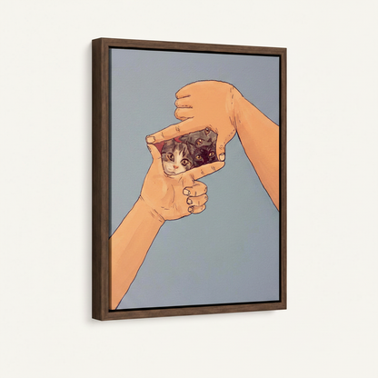 Framed canvas wall art with cat illustration shown at 45-degree angle on white background