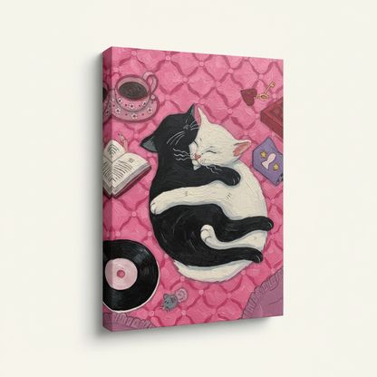 Gallery wrap canvas print of black and white cats cuddling shown at angle on cream background