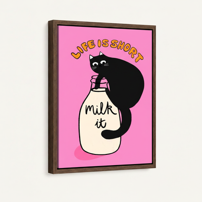 Close-up of framed black cat canvas showing vivid pink retro illustration in dark walnut float frame
