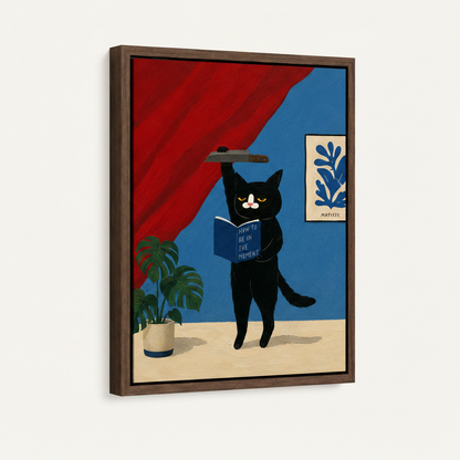 Framed canvas wall art featuring grumpy black cat reading, dark walnut frame, angled view on white background