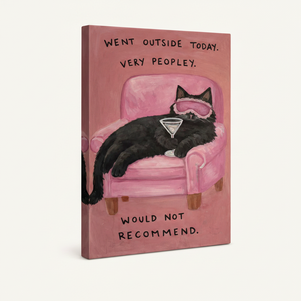 Gallery wrap canvas of funny black cat on pink chair with martini, frameless angled view