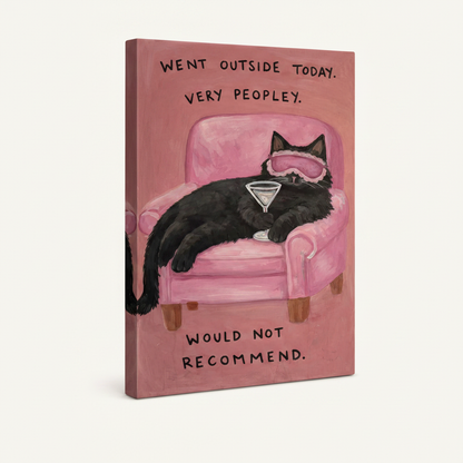 Gallery wrap canvas of funny black cat on pink chair with martini, frameless angled view
