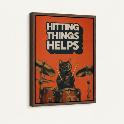 Floating frame canvas print of Hitting Things Helps cat drummer, 3/4 product view